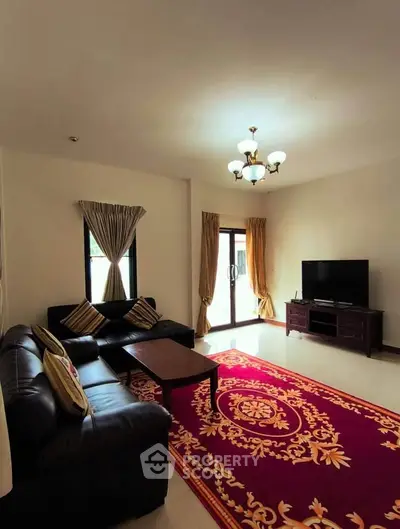 Spacious living room with elegant decor and natural light