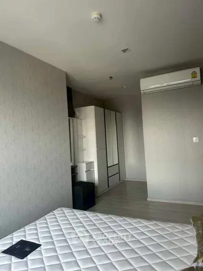 Modern bedroom with air conditioning and minimalist design