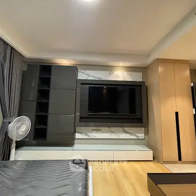 Modern living room with sleek TV unit and stylish decor