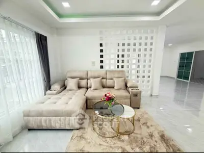 Modern living room with plush sectional sofa and stylish decor
