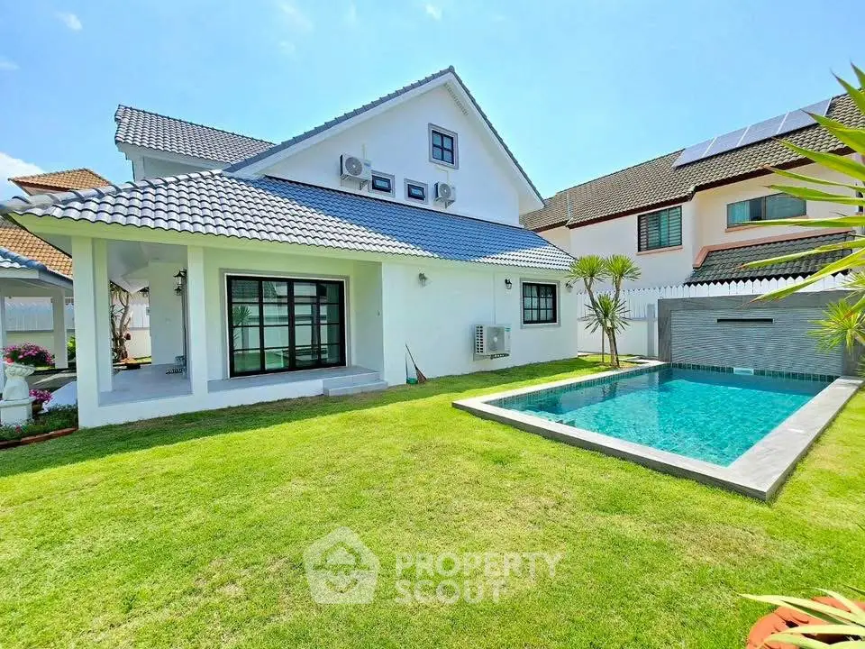 Charming modern house with private pool and lush garden, perfect for family living in a serene neighborhood.