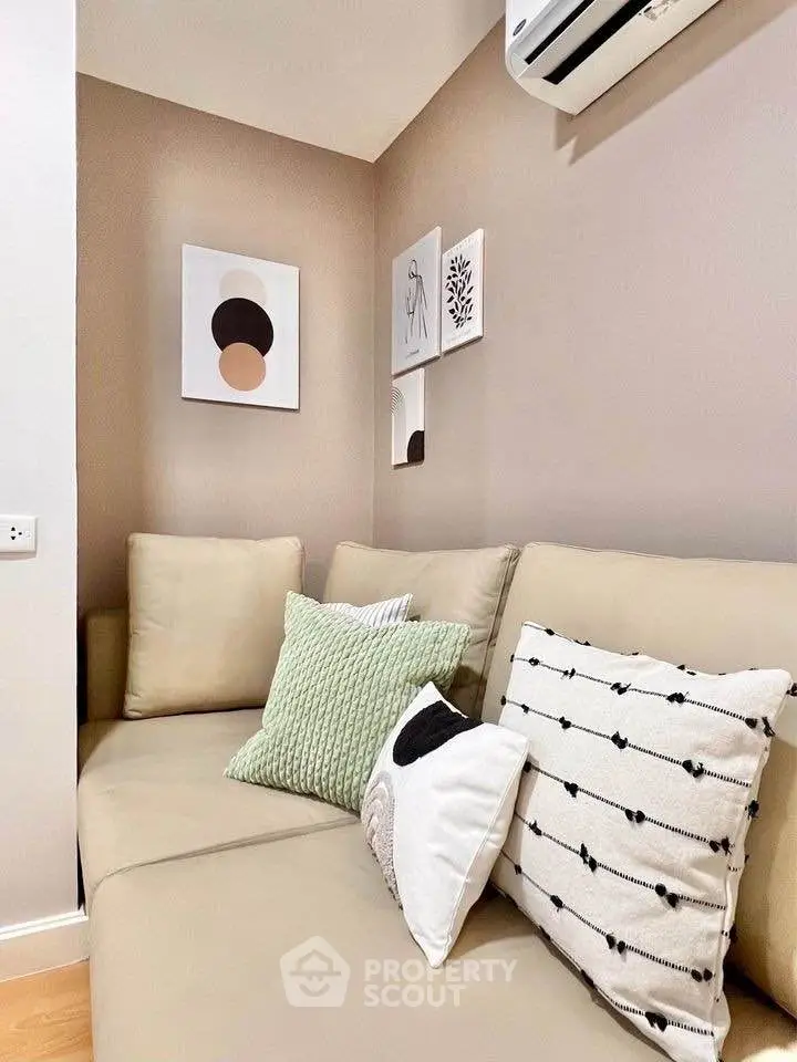 Cozy living room with modern decor and comfortable seating, perfect for relaxation.