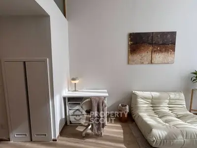 Modern living room with stylish furniture and cozy decor in a contemporary apartment.