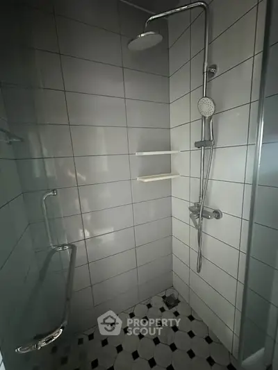 Modern bathroom with sleek shower fixtures and stylish tile design