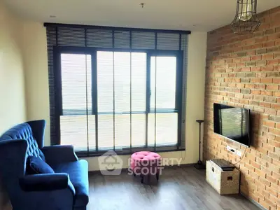 Chic living room with exposed brick wall and modern decor