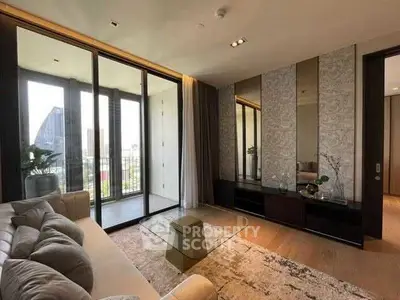 Luxurious living room with floor-to-ceiling windows and elegant decor