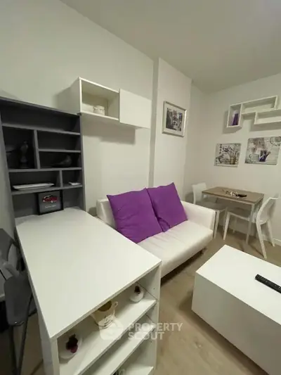 Modern living room with stylish furniture and vibrant decor accents