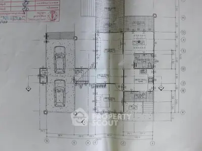 Architectural blueprint showcasing detailed floor plan with parking layout and room dimensions.