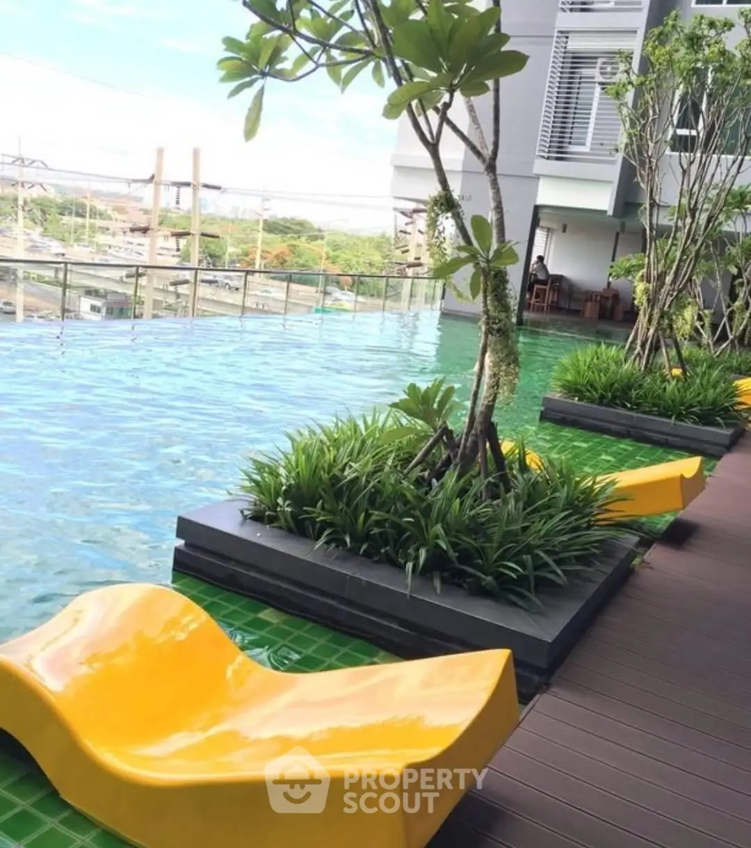 Luxurious rooftop pool with modern design and city views, perfect for relaxation and leisure.