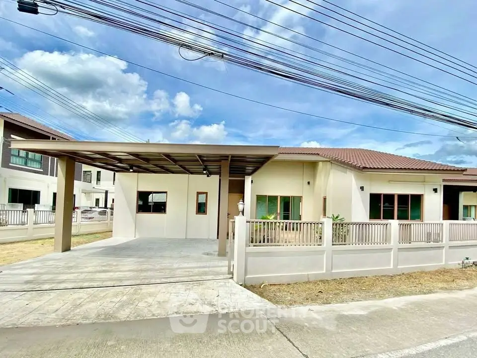 Charming single-story home with carport and fenced yard in a serene neighborhood.