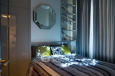 Modern bedroom with stylish decor and ample natural light