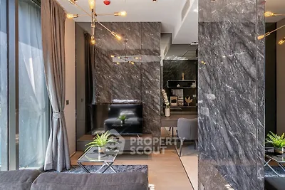 Luxurious modern living room with marble accents and stylish lighting