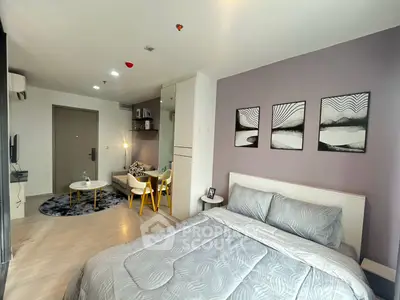 Modern studio apartment with stylish decor and cozy living area