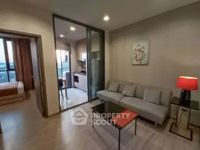 Modern apartment interior with cozy living room and open kitchen layout