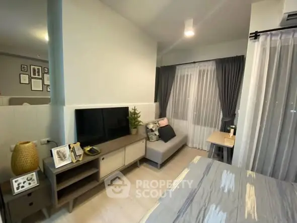 Cozy modern living room with stylish decor and natural light