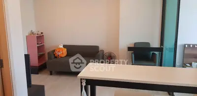 Cozy living room with modern furniture and stylish decor in a contemporary apartment.