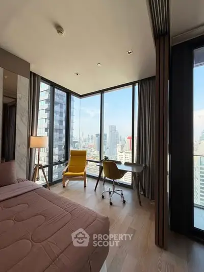 Luxurious corner bedroom with stunning city view and modern furnishings