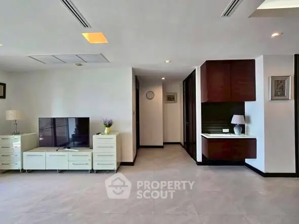 Spacious modern living room with sleek furniture and elegant decor