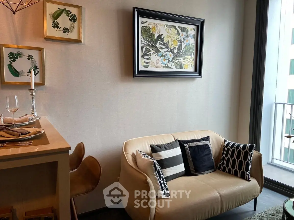 Stylish modern living room with cozy sofa and chic decor near balcony