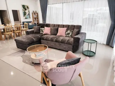 Stylish modern living room with plush gray sofa and elegant decor