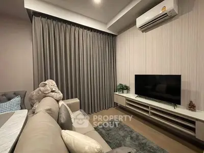 Cozy living room with modern decor and air conditioning