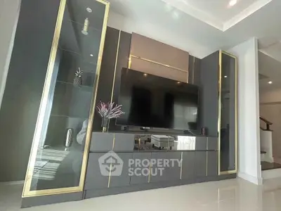 Modern living room with sleek entertainment center and stylish decor
