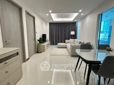 Modern living room with sleek furniture and open layout, perfect for contemporary living.