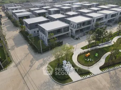 Modern residential complex with spacious villas and landscaped gardens.
