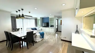 Spacious modern living room with elegant dining area and natural light