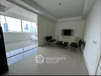 Modern living room with sleek furniture and city view