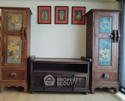 Charming interior with vintage wooden cabinets and artistic wall decor
