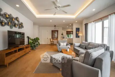 Spacious modern living room with stylish decor and natural light