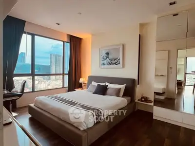 Luxurious bedroom with stunning city view and modern decor