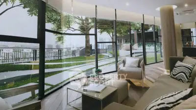 Luxurious living room with floor-to-ceiling windows offering stunning garden views, elegant decor, and modern furniture.