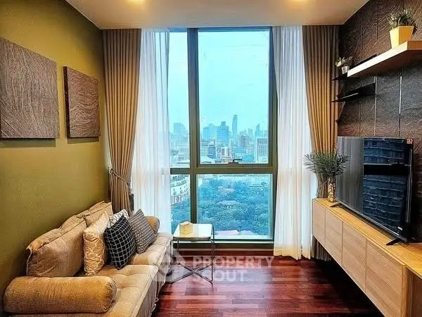 Stylish living room with city view, modern decor, and cozy seating area.