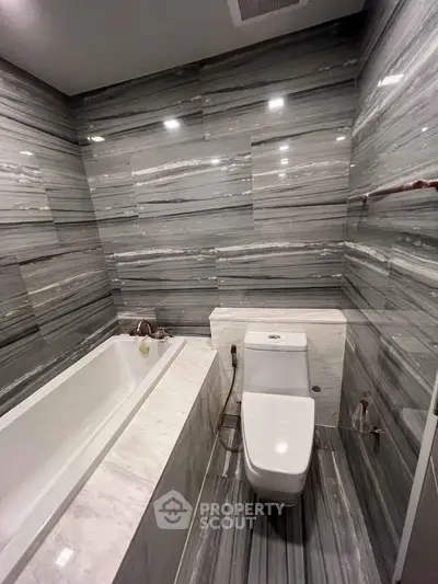 Luxurious bathroom with elegant marble tiles and modern fixtures