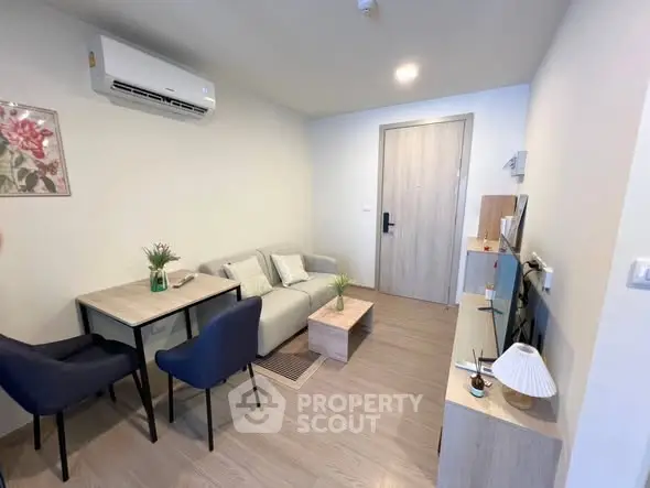 Modern living room with cozy seating and stylish decor