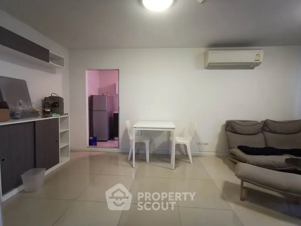 Modern living room with minimalist furniture and air conditioning