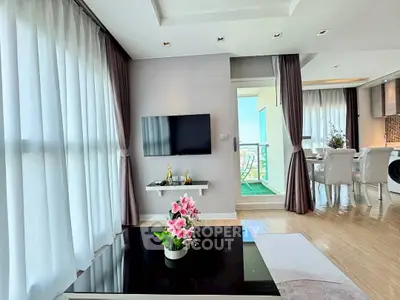 Modern living room with elegant decor and balcony view