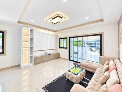 Spacious modern living room with elegant lighting and large windows