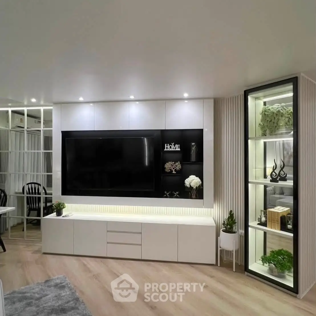 Modern living room with sleek TV unit and stylish decor
