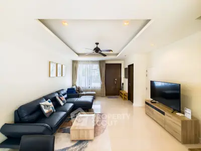 Spacious modern living room with sleek furniture and natural light