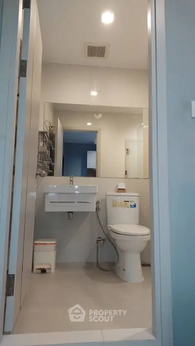Modern bathroom with sleek fixtures and neutral tones