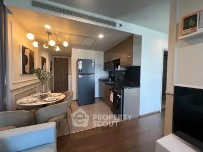 Modern open-layout kitchen with dining area and stylish decor