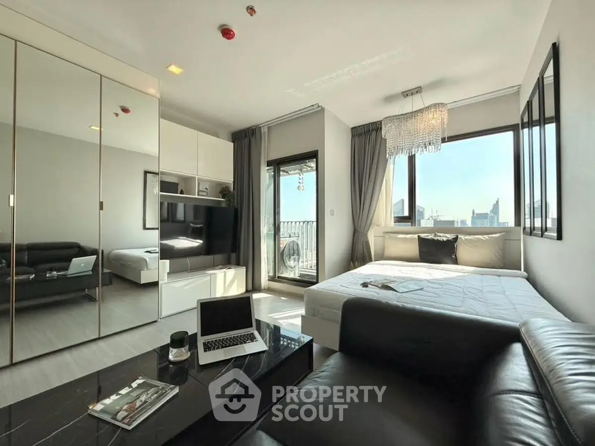 Modern studio apartment with sleek design and city view