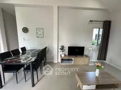 Modern living room with dining area and stylish decor