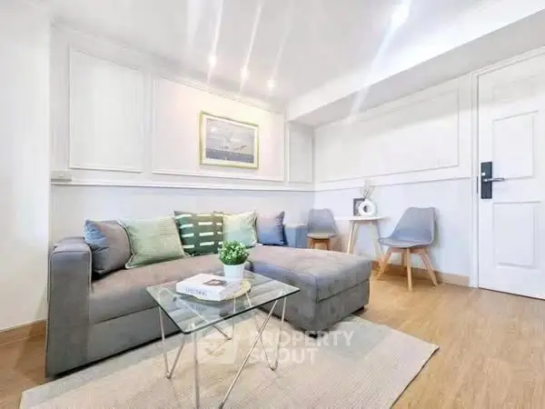 Modern living room with stylish decor and cozy seating area