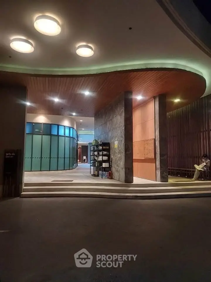 Elegant building entrance with modern lighting and sleek design