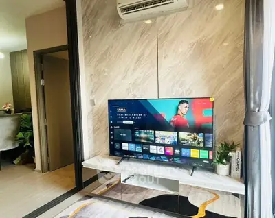 Modern living room with sleek TV setup and stylish decor