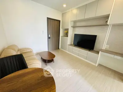 Modern living room with sleek furniture and built-in storage